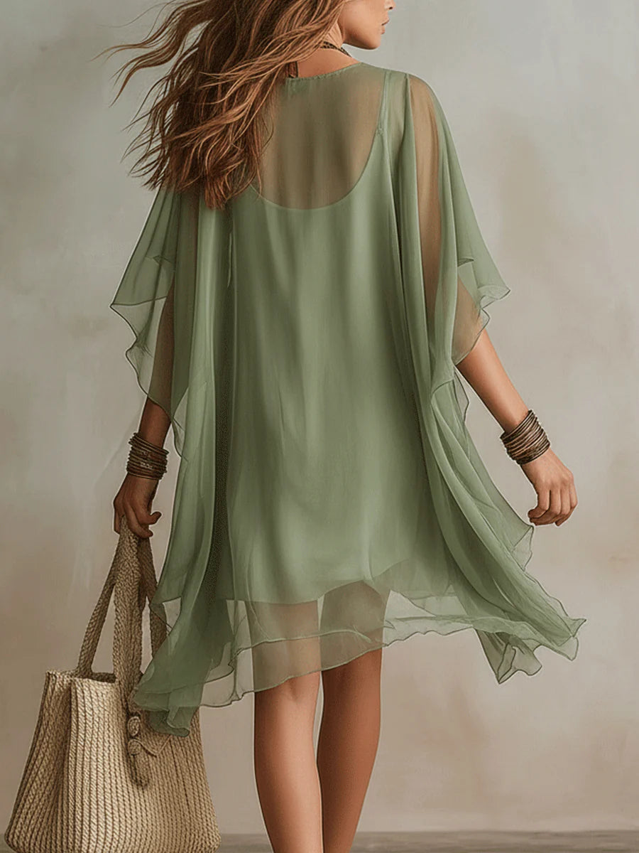 Smeraldo | Vestido corto verde fluido con capas y escote en V