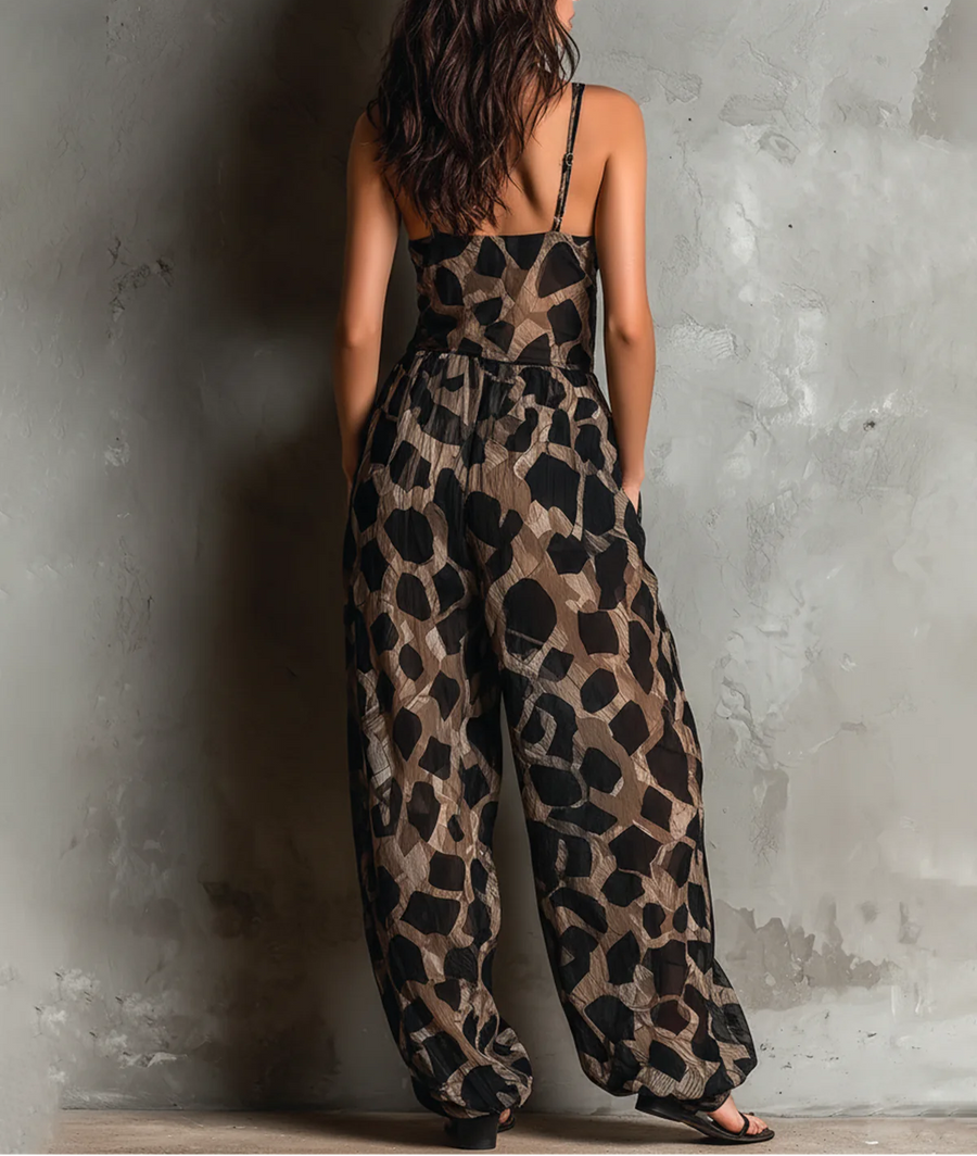 Roberta | Mono de gasa negro con estampado animal