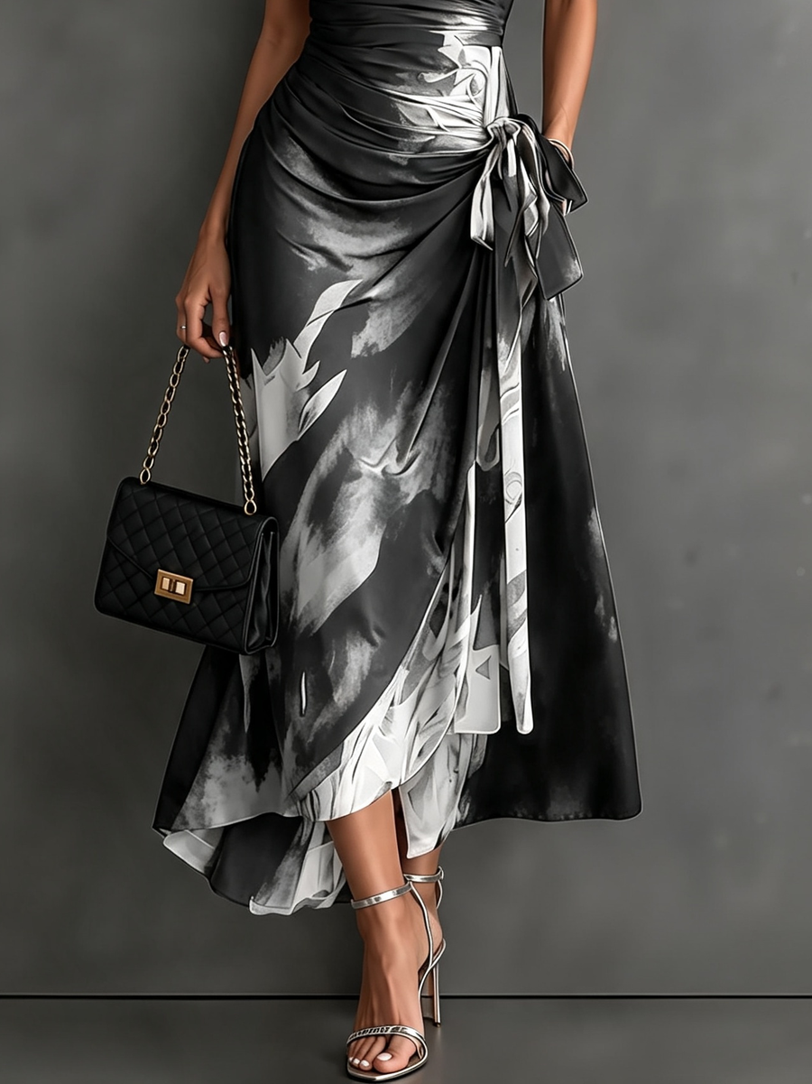 Carmen | Vestido midi cruzado con estampado abstracto y bajo con volante