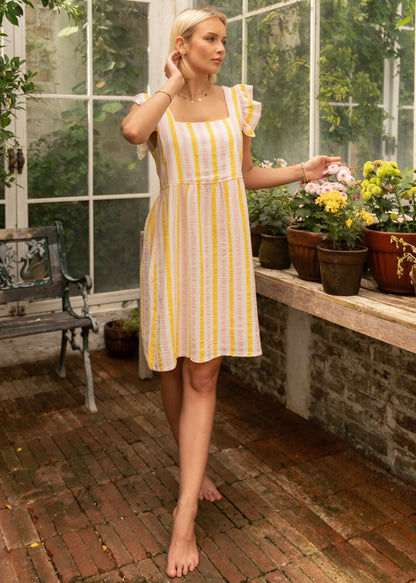 Fiora | Vestido de muselina a rayas · Rosa y amarillo