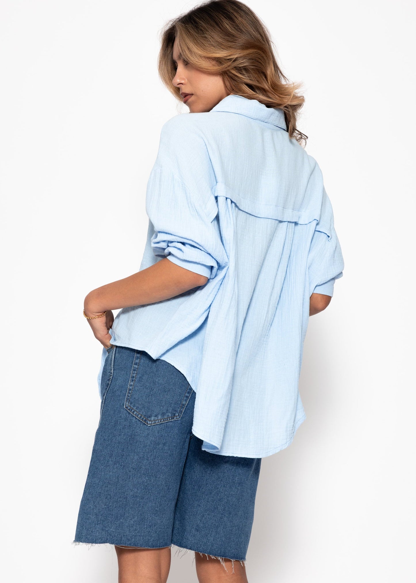 Emma | Blusa oversize de muselina · Azul claro