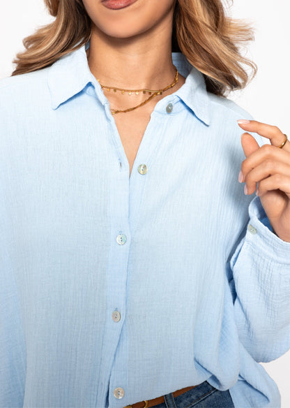 Emma | Blusa oversize de muselina · Azul claro