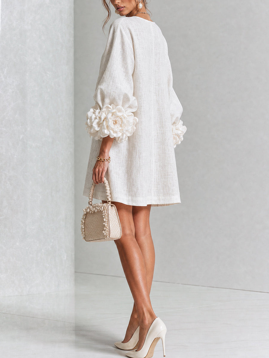 Bianca | Vestido corto con botones de flores y mangas abullonadas