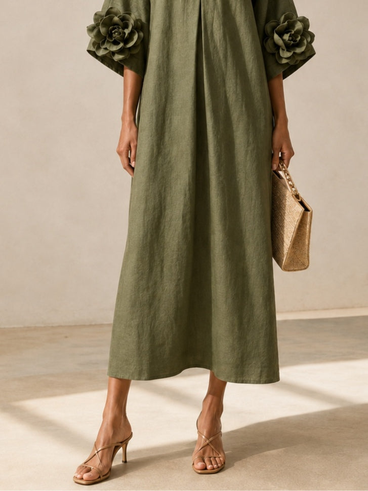 Emma | Vestido midi verde oliva con escote en V y detalle de camelia
