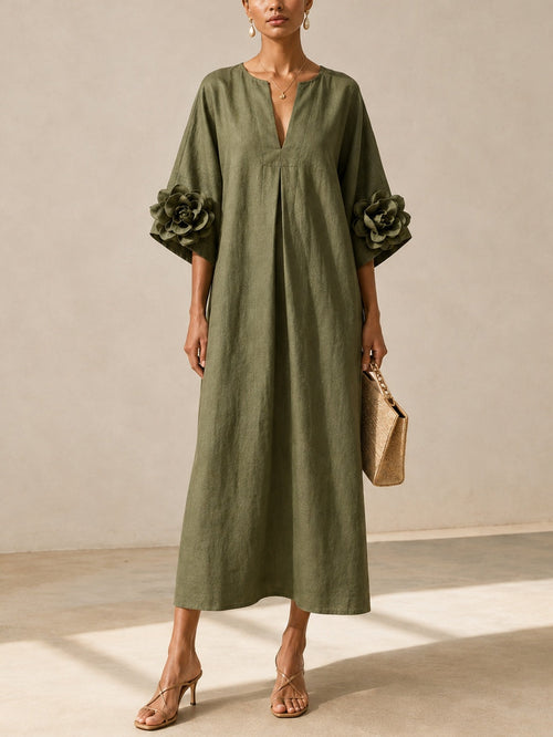 Emma | Vestido midi verde oliva con escote en V y detalle de camelia