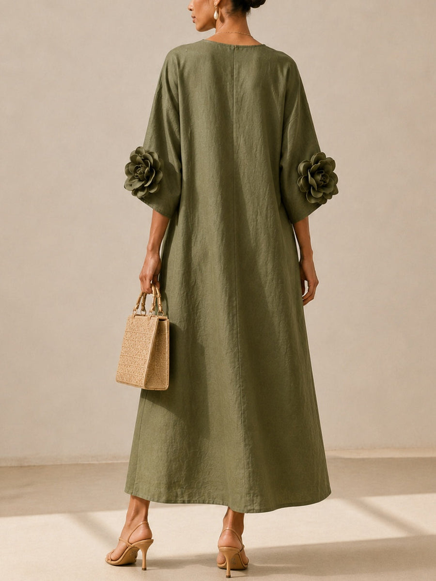 Emma | Vestido midi verde oliva con escote en V y detalle de camelia