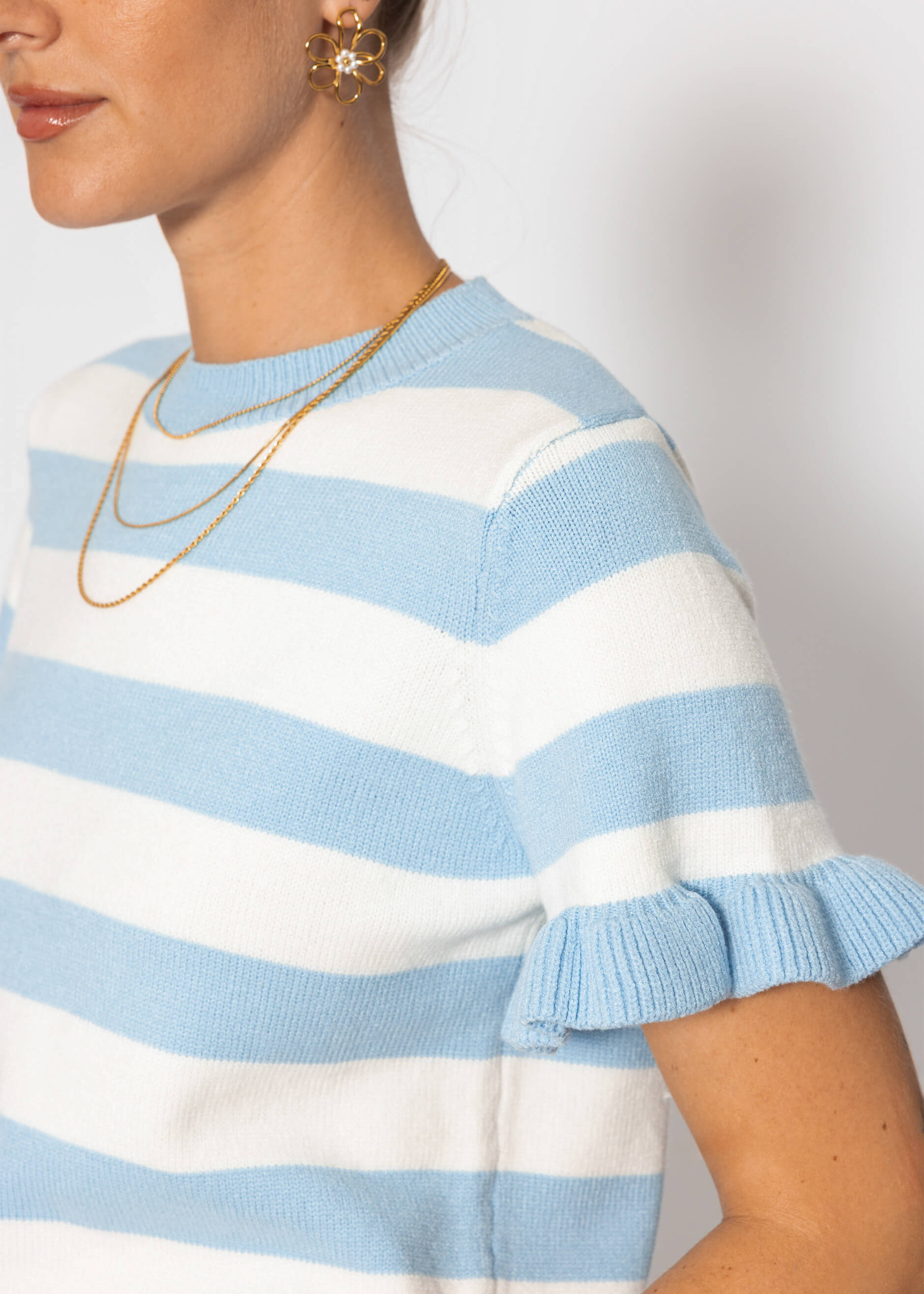 Alaia | Jersey a rayas · Azul y blanco roto
