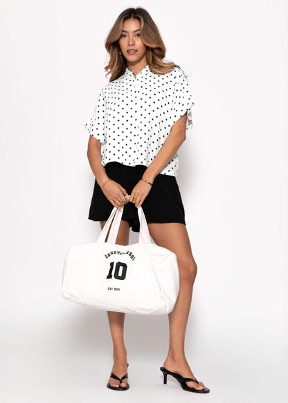 Elena | Blusa de muselina de lunares · Blanco