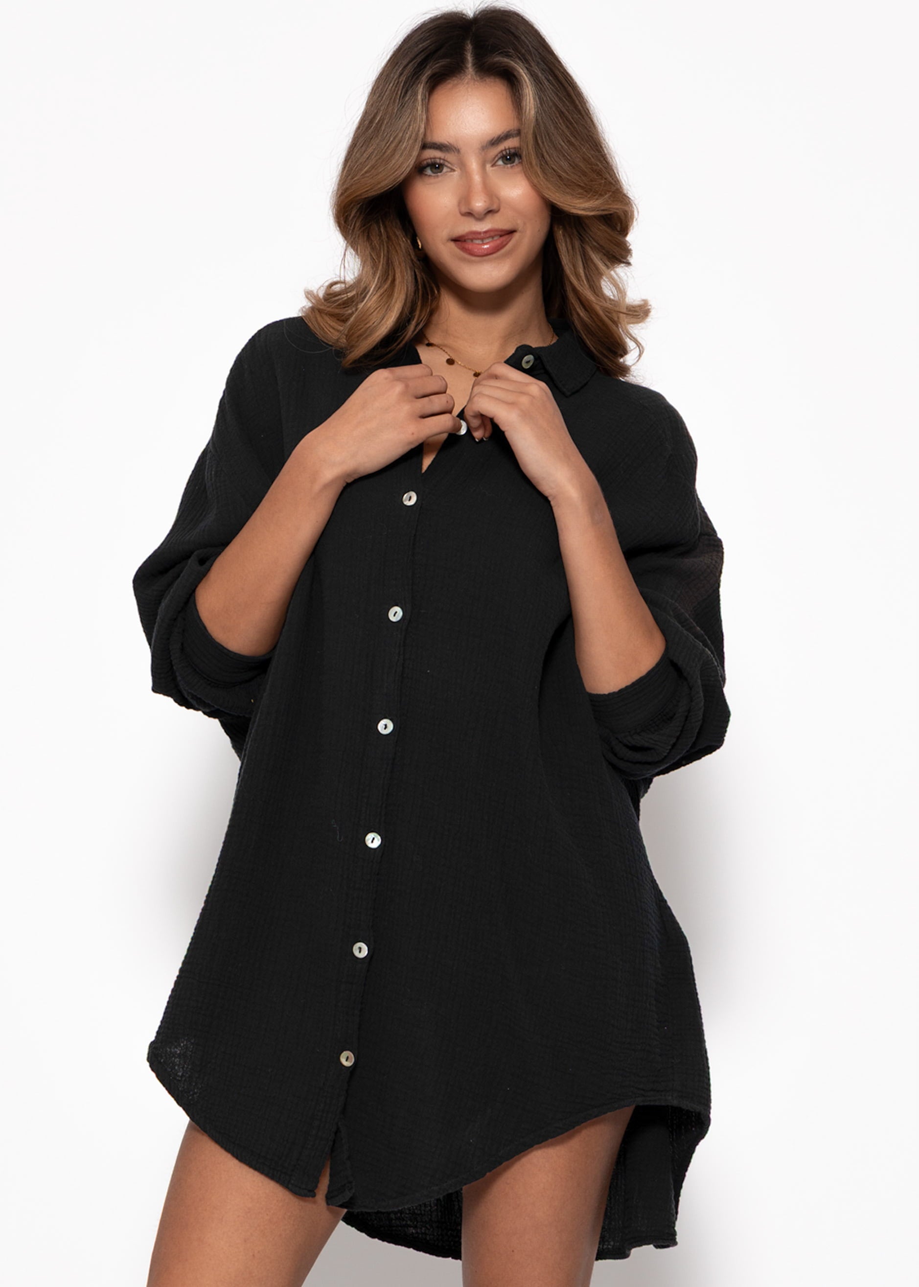 Marta | Blusa oversize de muselina · Negro