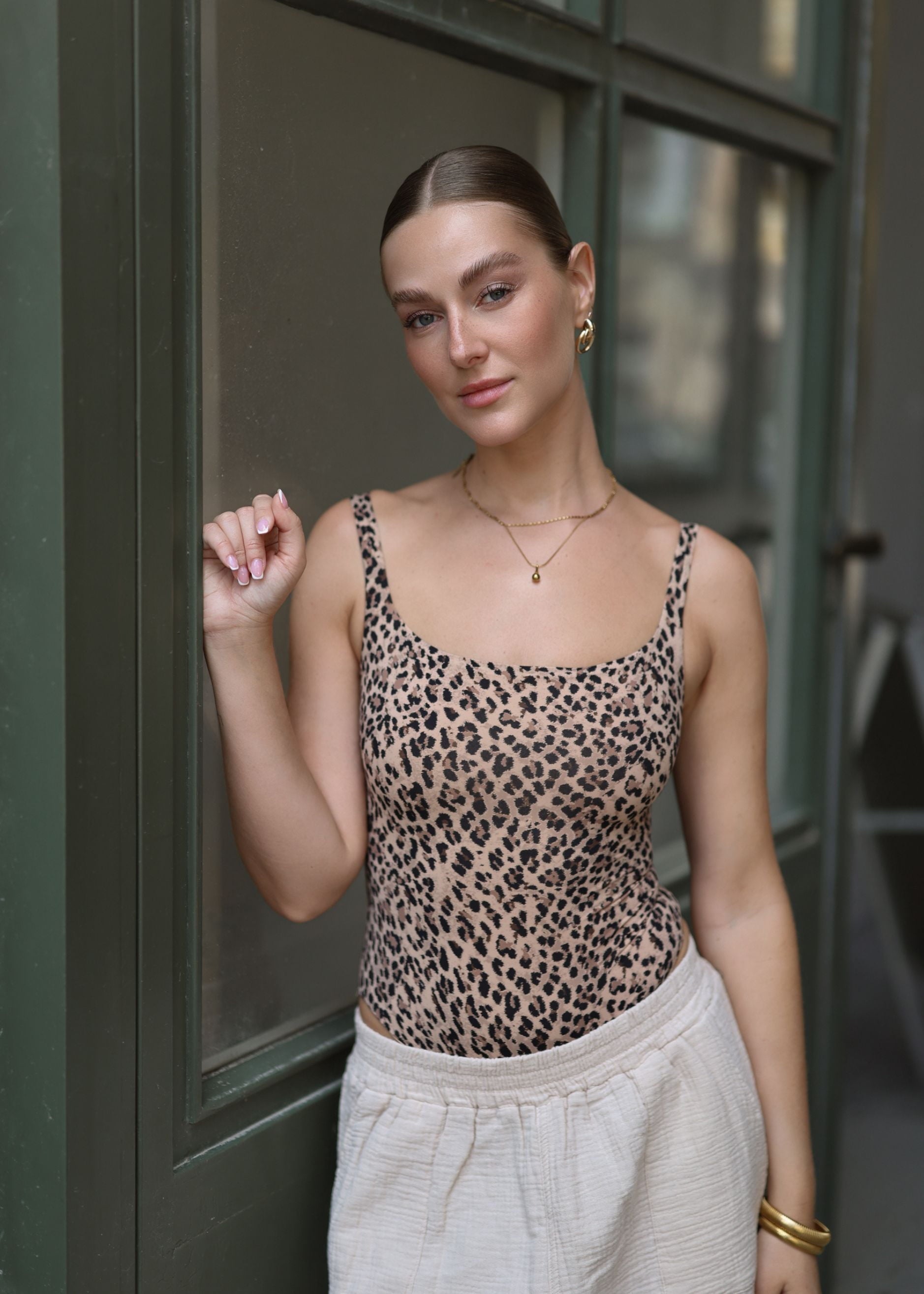 Thais | Body estampado leopardo · Marrón