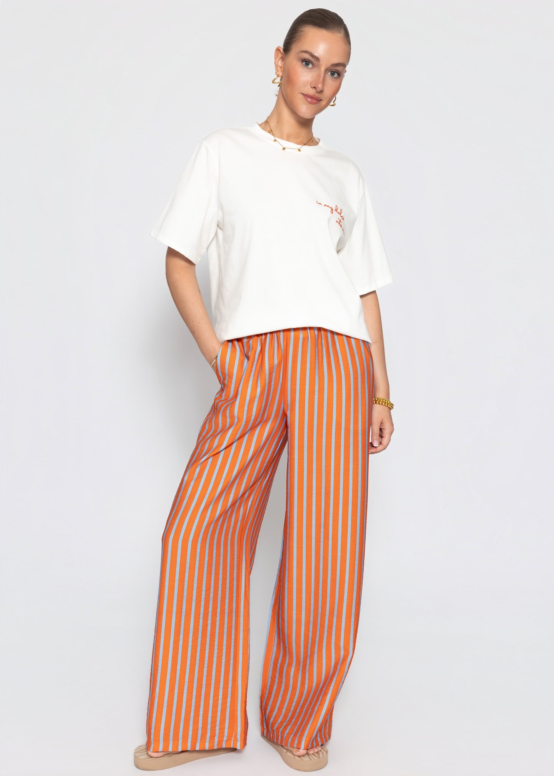 Ariadna | Pantalón a rayas · Naranja
