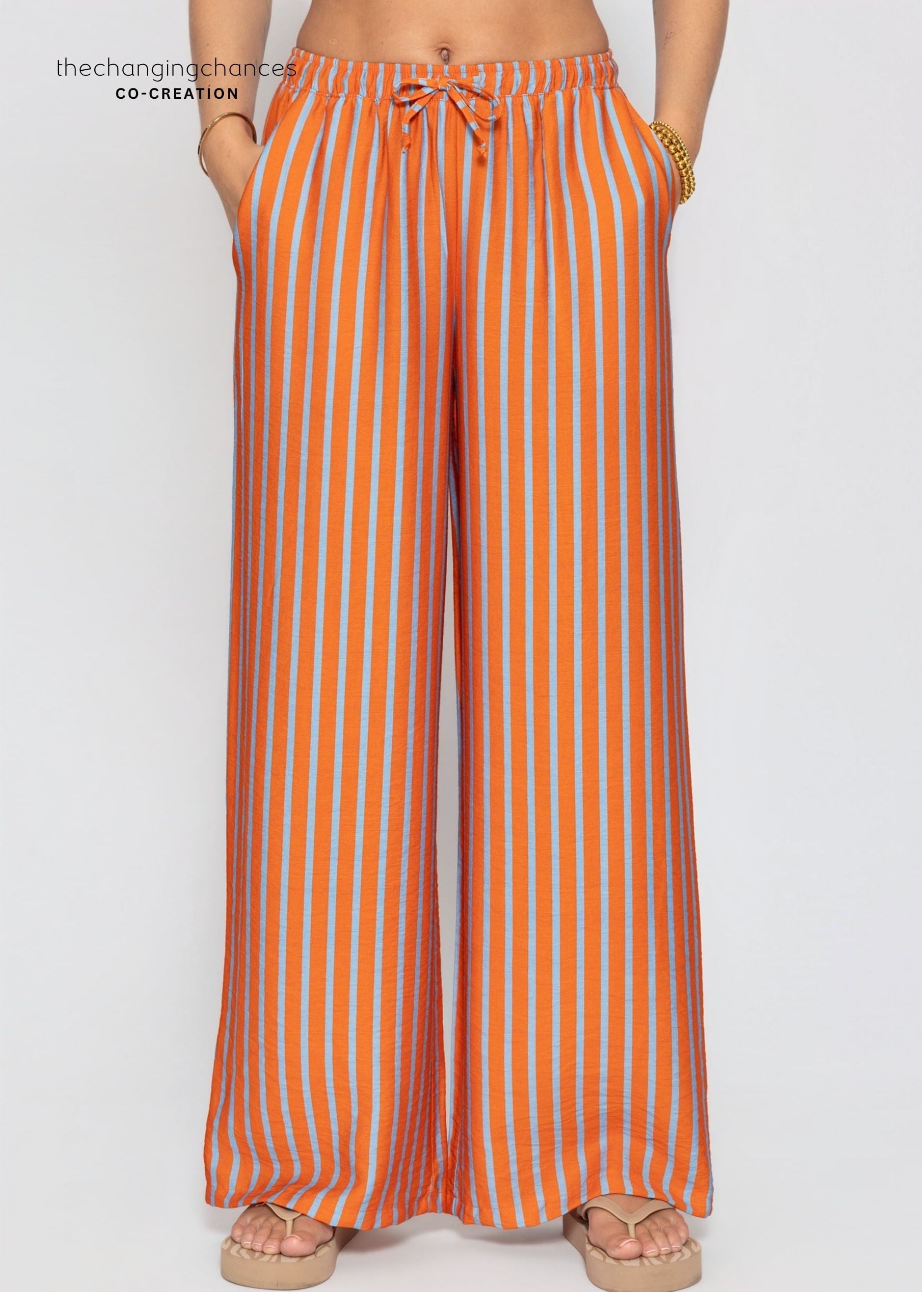 Ariadna | Pantalón a rayas · Naranja