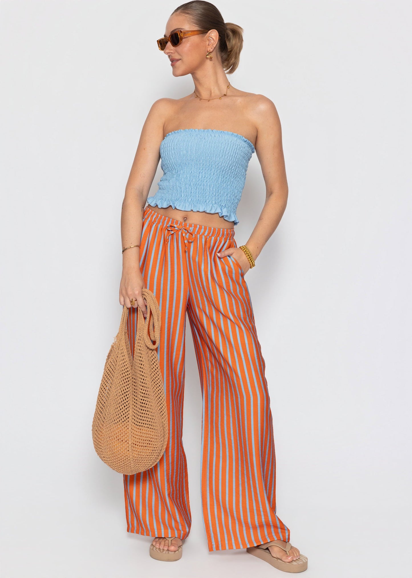 Ariadna | Pantalón a rayas · Naranja