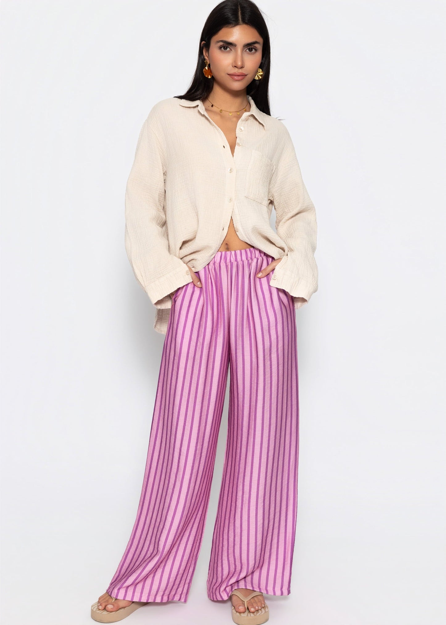 Nira | Pantalón a rayas · Rosa