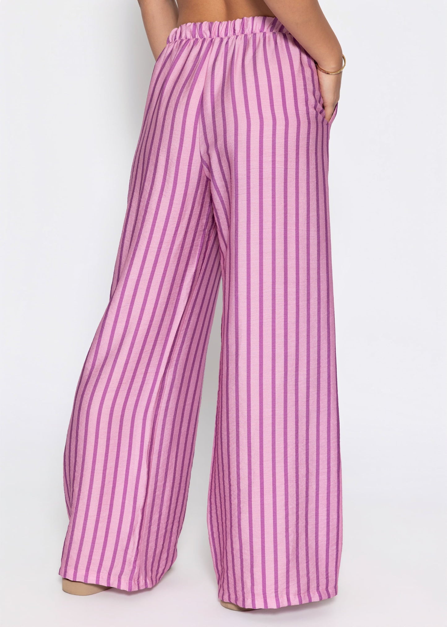 Nira | Pantalón a rayas · Rosa