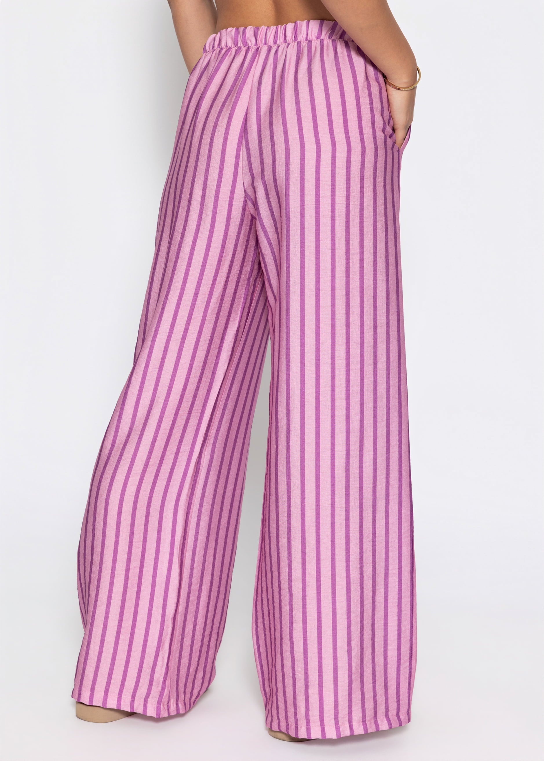 Nira | Pantalón a rayas · Rosa