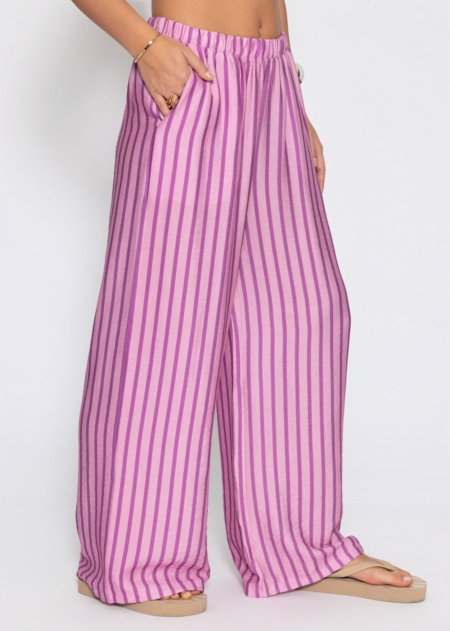 Nira | Pantalón a rayas · Rosa