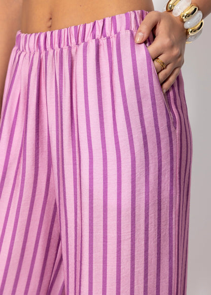 Nira | Pantalón a rayas · Rosa
