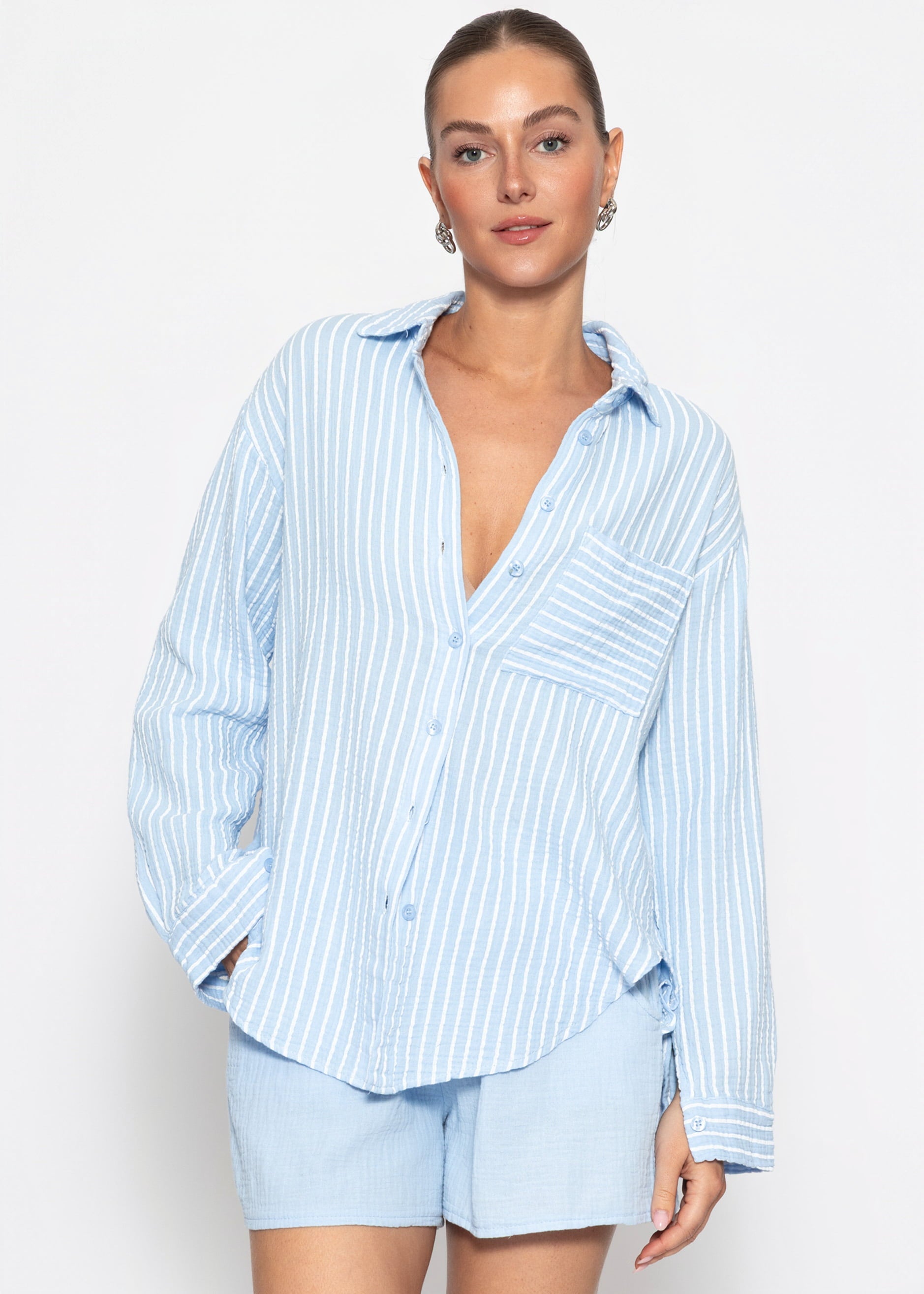 Rania | Blusa de muselina a rayas · Azul claro