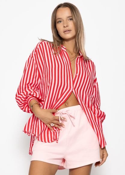Daniela | Blusa oversize de muselina a rayas · Rojo y fucsia