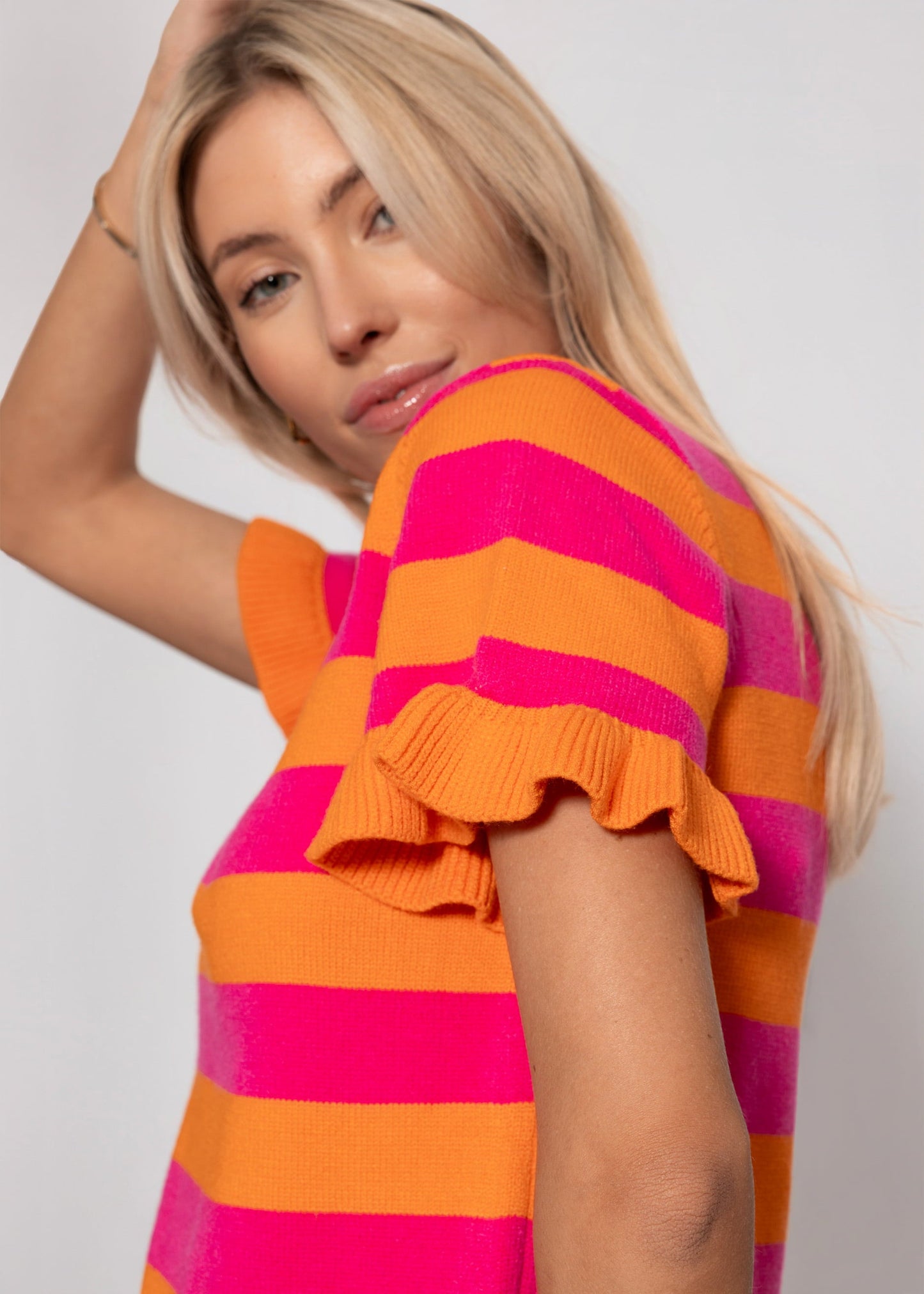 Carmela | Jersey a rayas · Naranja y fucsia